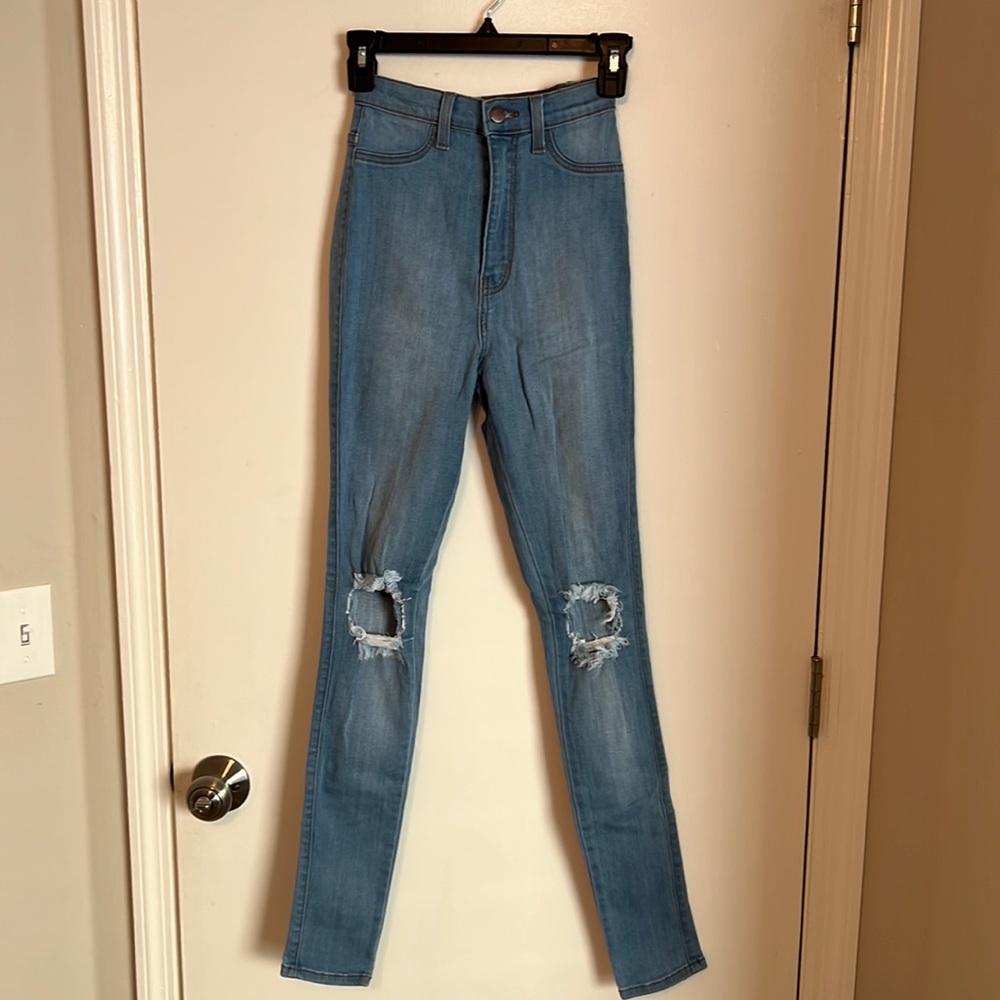 Vibrant MIU Jeans. Light wash. Ripped knee